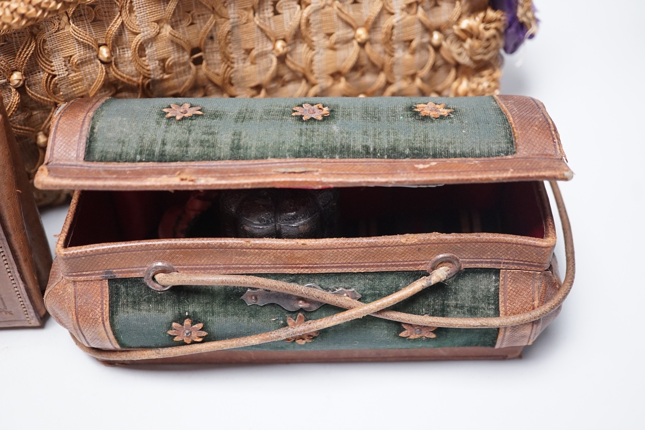 An unusual Edwardian straw and braided basket/bag, a French late 19th century basket with makers mark on metal mounts Berthelon, Macon, a small leather and velvet vanity case and contents and leather stationary case